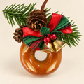 Front view of Doubie Dough real bread bagel Christmas ornament with tartan bow and bells